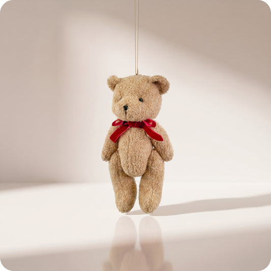 Teddy bear marrón con lazo rojo grande