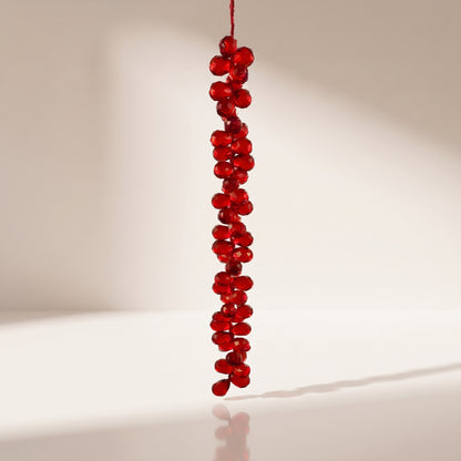 Guirnalda de piedras acrílicas roja