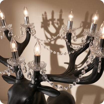 Reno decorativo con candelabro negro en cuernos chico