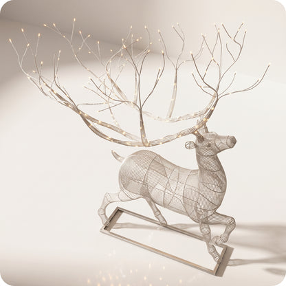 Reno navideño con luz led calidas caminando