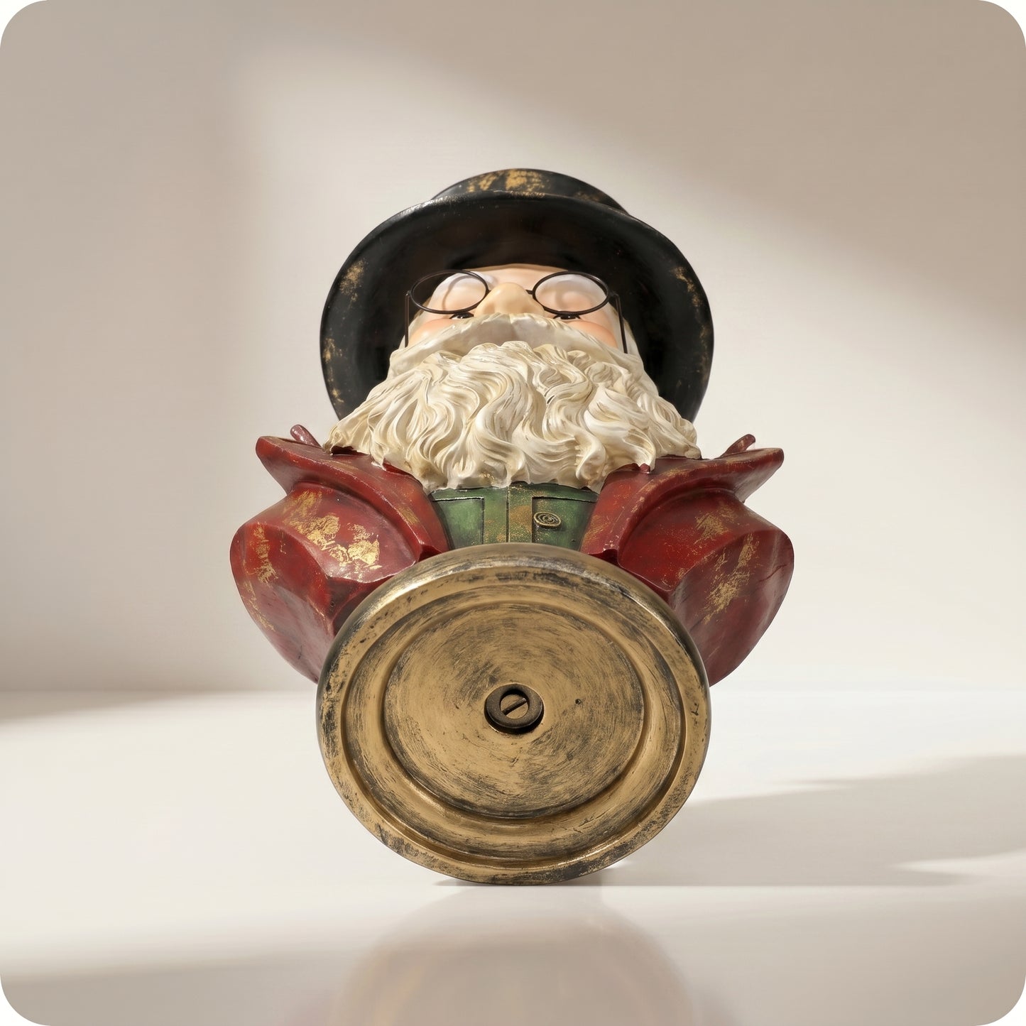 Papá noel de resina sobre pedestal