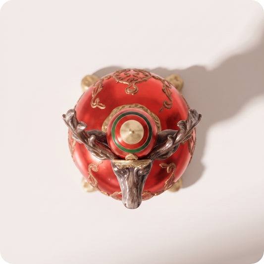 Figura decorativa navideña con cabeza de reno y base tipo esfera