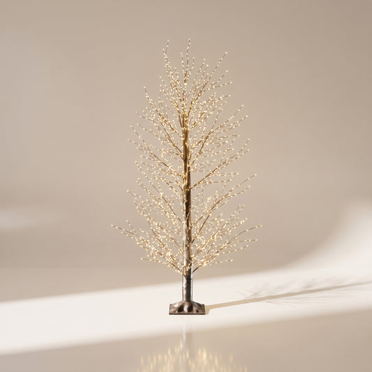 Árbol negro de micropuntos modelado de luz calida